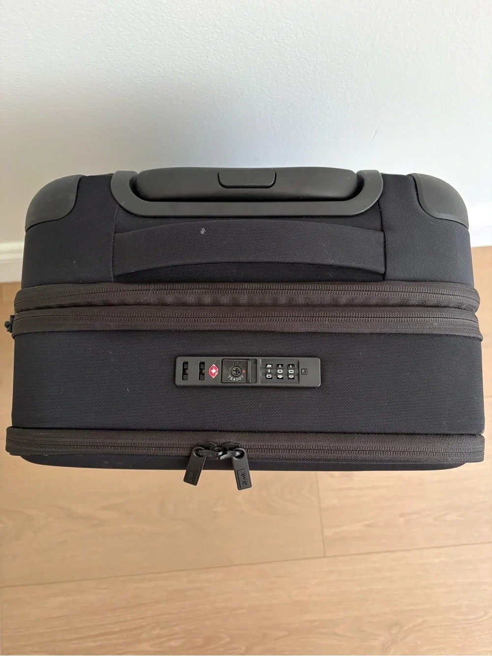 Away Black Carry-On Travel Case with Spinner Wheels (expandable collection)